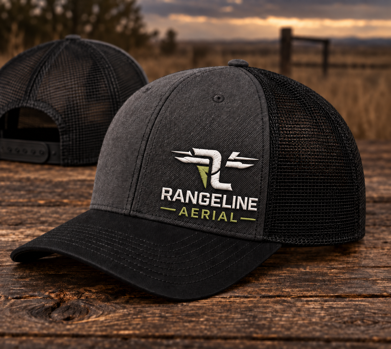 Charcoal and black RangeLine Aerial trucker cap with an off-center embroidered logo